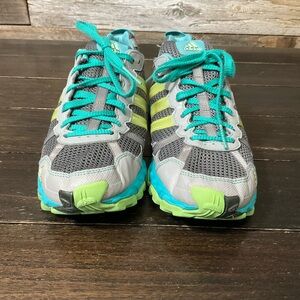 Women's Adidas Thrasher TR trail running shoes in gray, lime green, and blue.